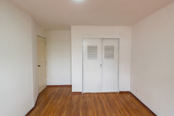 Apartment room with built-in Closet