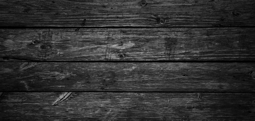 Scratched brown black wooden textured flooring background