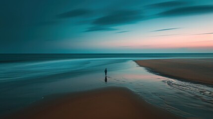 Melancholy induced solitary figure on empty beach with long exposure seascape, with copy scape