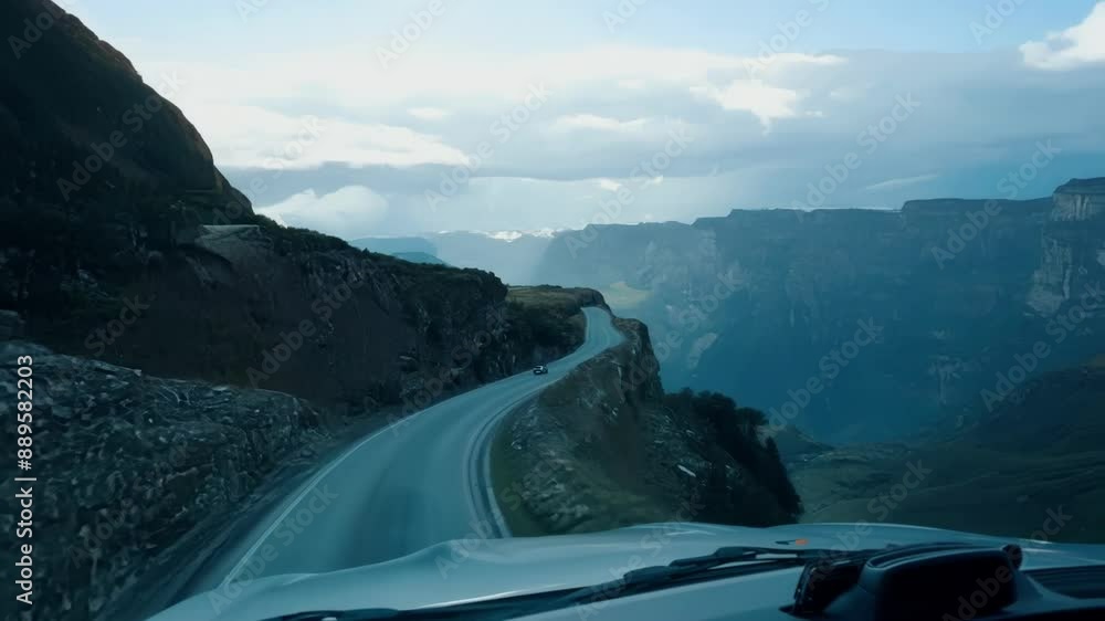 Poster maneuvering through the narrow alpine passes required intense focus and precise driving skills to av