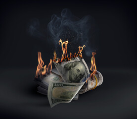 Dollar banknotes burning in darkness. Financial crisis