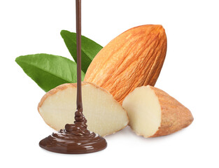 Pouring sweet chocolate onto almonds against white background