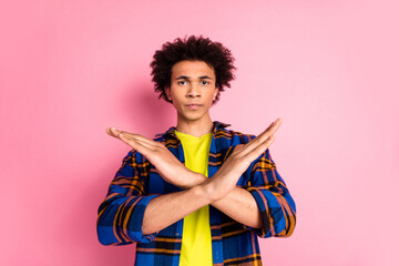 Photo of serieous confident funny nice man wear checkered clothes isolated on pink color background