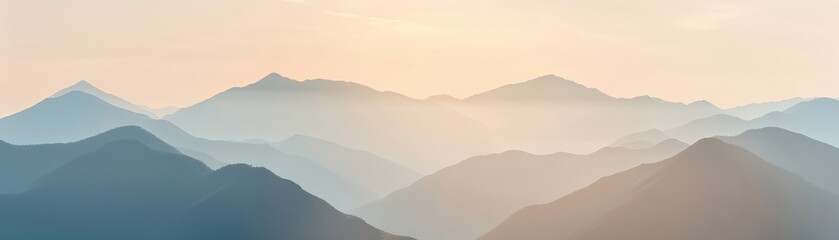 Fototapeta premium Serene mountain landscape at sunrise with soft pastel hues, showcasing multiple mountain ranges fading into the distance.