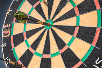 dart board with darts