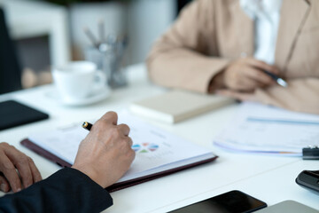 businessman and businesswoman Sitting in the office meeting