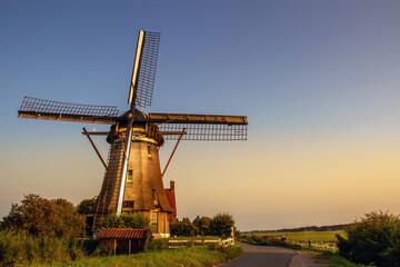 Fototapeta premium dutch windmill at sunset