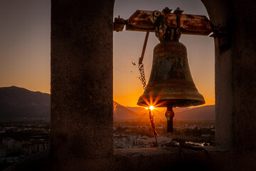 bell at sunset, Metković, Croatia