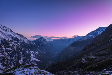 View during sunset from Rupin pass trek campsite.This trek is full of diversity from majestic...