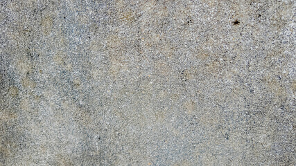 Close-up of a weathered concrete wall texture, ideal for backgrounds, construction concepts, and urban themes