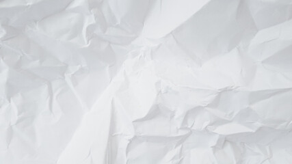 Crumpled white paper background representing creative block or recycling concept during the festive season of Earth Day