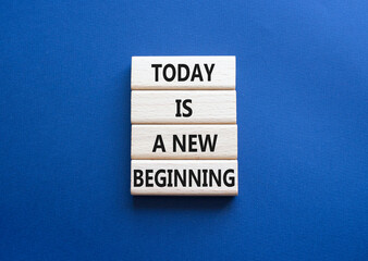 Today is a new beginning symbol. Wooden blocks with words Today is a new beginning. Beautiful deep...