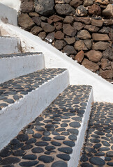 White stairs and an old wall, La Graciosa, Spain