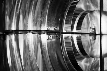 Abstract black and white photo of a Lighthouse lamp with a Fresnel lens
