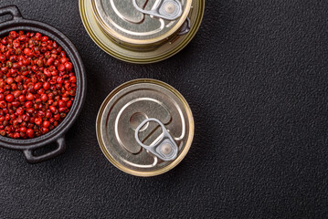 Metal can with canned meat or fish with a key to open it