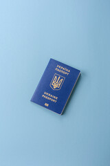 Biometric Ukrainian passport on a blue background