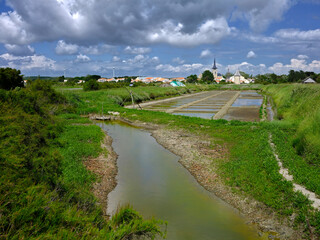 Marshes and salty tide at Ile d'Olonne north of the sands of Olonne, commune in the Vendée department in the Pays de la Loire region in western France