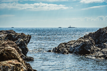 Scenic landscape with Ohira rock Lighthouse on the Pacific Ocean coast in Nachikatsuura, Wakayama, Japan.