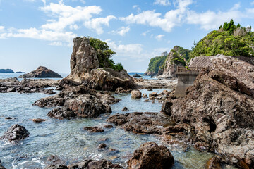 Dramatic rock formations on the coast of Pacific Ocean in Nachikatsuura, Wakayama, Japan, part of the Yoshino-Kumano National Park and Nanki Kumano geopark.
