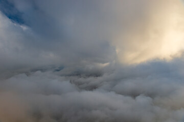 Obraz premium Picturesque dramatic clouds from a bird's eye view. A cloudy landscape
