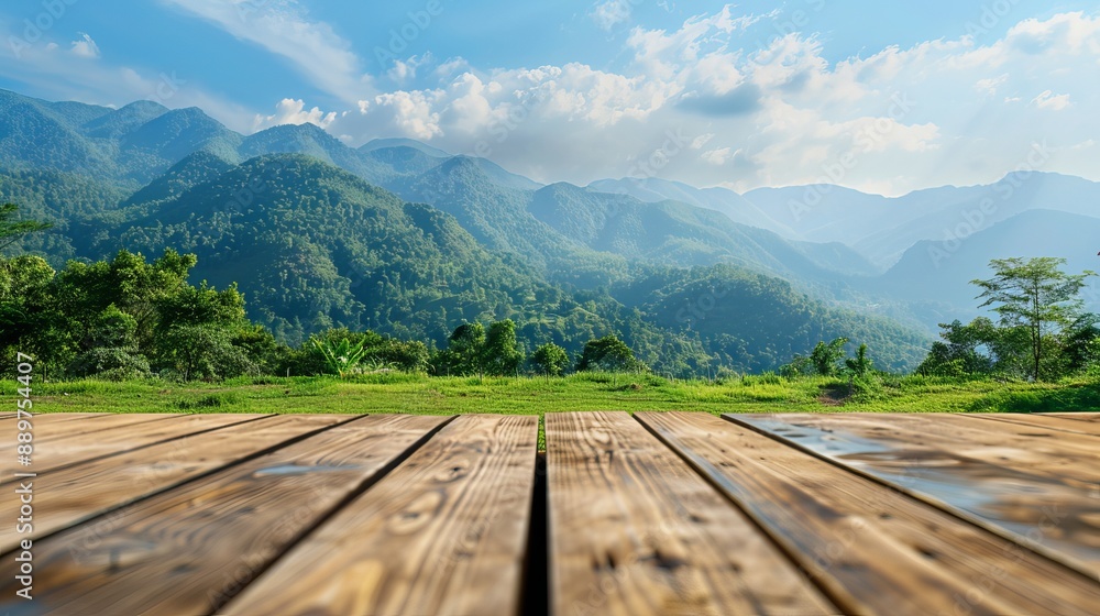 Poster wooden tabletop with a blurred background of mountains and grass fields concept of freshness and rel