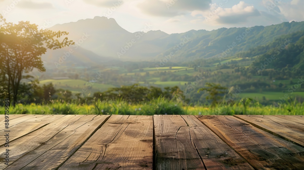 Poster wooden tabletop with a blurred background of mountains and grass fields concept of freshness and rel