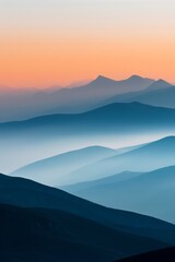 Fototapeta premium Breathtaking Mountain Range at Sunrise with Layers of Misty Peaks and Vibrant Sky