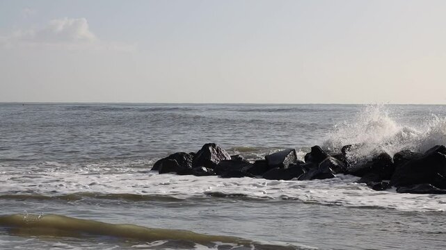 Waves on a rocky beach. Ocean coastline. Stop motion moving image clip mp4. Santa Severa Italy