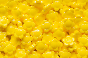 Background of little yellow sugar flowers.