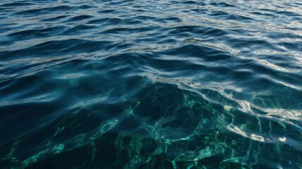 Close-up of water surface with gentle ripples and reflections, creating a serene and tranquil texture perfect for backgrounds and design projects.