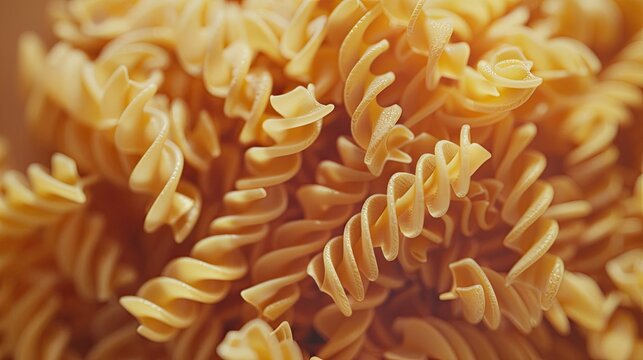Uncooked fusilli pasta The uncooked italian pasta Top view