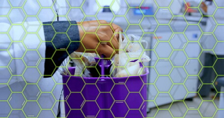 Image of scientific data processing over biracial female scientist in laboratory