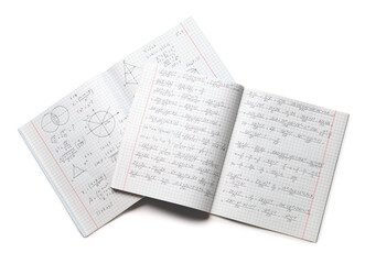 Copybooks with handwritten maths formulas isolated on white background