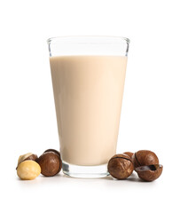 Glass of fresh macadamia milk on white background