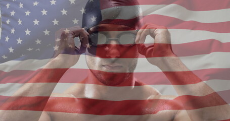 Image of flag of usa over biracial male swimmer