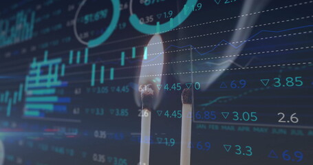 Image of financial data processing over lit match