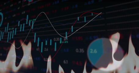 Image of financial data processing over flames