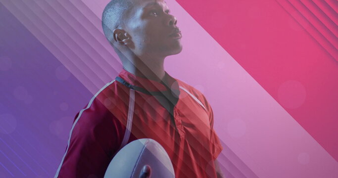 Image of flag of france over african american male rugby player with ball - Powered by Adobe