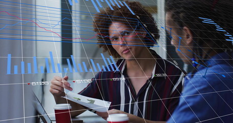 Image of blue charts processing data over diverse male colleagues talking at casual office