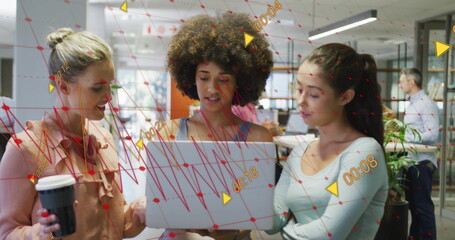 Image of graph and processing data over diverse female colleagues using laptop at casual office