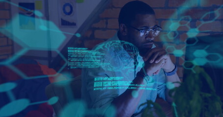 Image of human brains and digital data processing over african american man