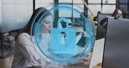 Image of padlock digital icon and data processing over caucasian businesswoman in office