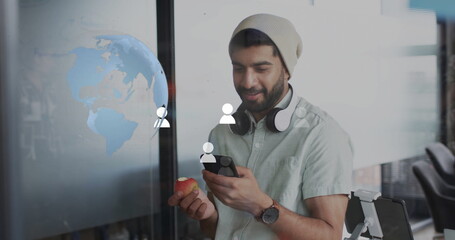 Image of digital icons, globe and data processing over biracial businessman in office