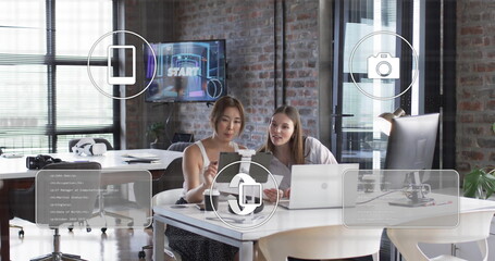 Image of digital icons and data processing over diverse business people in office