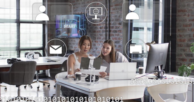 Image of digital icons and data processing over diverse business people in office