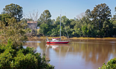 Sailing boat moored in a river