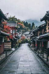 Obraz premium An empty street in the center of the frame, surrounded by traditional japanese houses