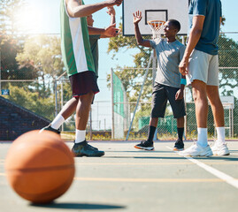 Naklejka premium Sports, teamwork and high five with man on basketball court for summer, winner and training. Success, goals and fitness with basketball player and celebration for friends, support and community