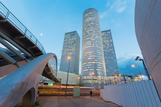 Tel Aviv - The skyscrapers of Azrieli Center in evening light by Moore Yaski Sivan Architects with measuring 187 m (614 ft) in height.