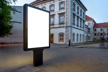 Blank Poster Billboard Mockup On Sidewalk. Outdoor Advertising Display At Night